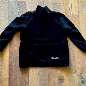 Peloton zip neck sweatshirt with front pocket.
